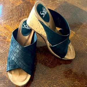 wedge cork heel w/ black upper leather crisscross comfort support straps.